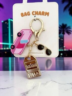 Anthropologie Miami city bag charm pink enamel car gold tag key charm NWT